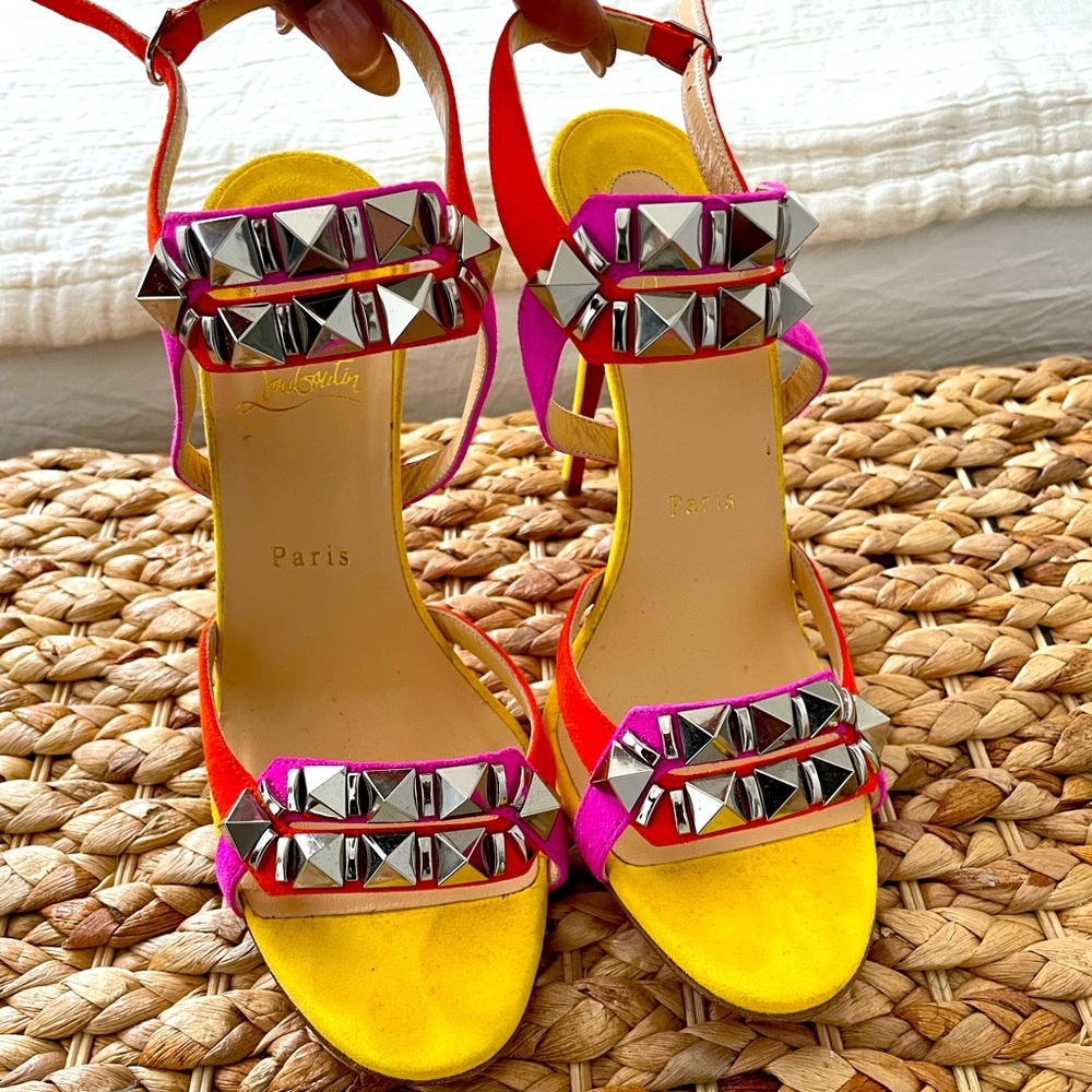 Multi colored suede Christian Louboutin heels, silver accent.
